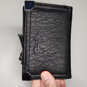 Jessica Simpson Black Leather Zip Wallet